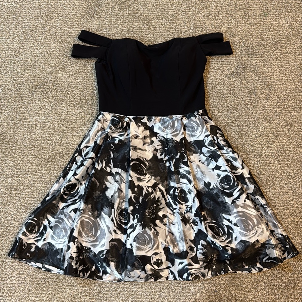 Black and white formal dress. With pads, grippy strip to stay up,and puffy skirt